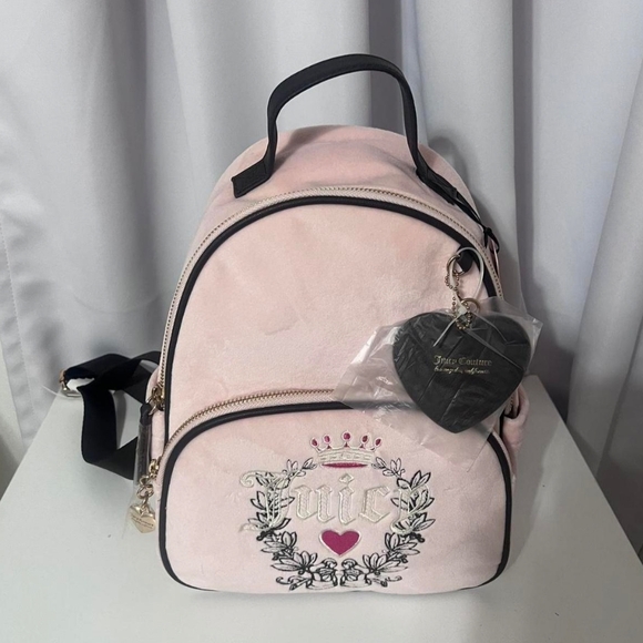 Juicy Couture Handbags - Juicy Couture Light Pink Backpack with Heart Charm
